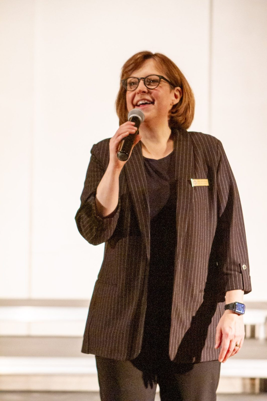 Cathy LaFrombois speaking into a microphone